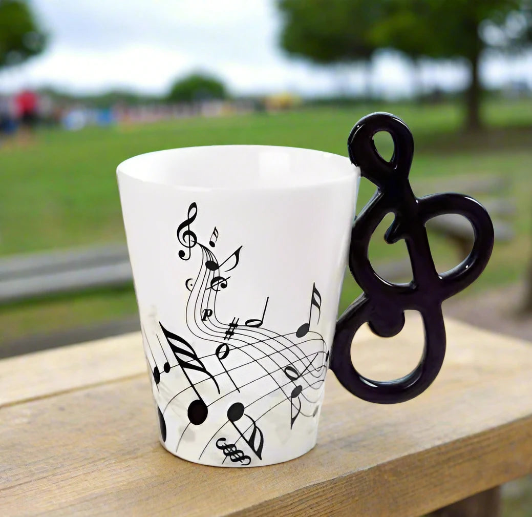 White ceramic coffee mug featuring black musical notes pattern with comfortable handle, 250ml capacity 3