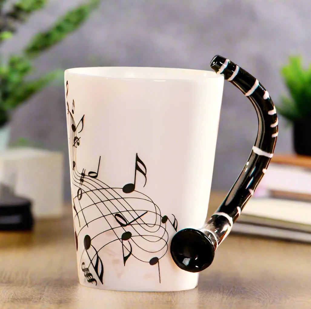 Detailed view of elegant musical notes design on white ceramic coffee mug surface