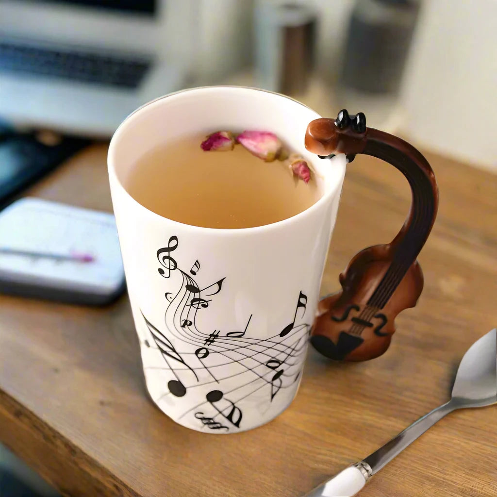 White ceramic coffee mug featuring black musical notes pattern with comfortable handle, 250ml capacity