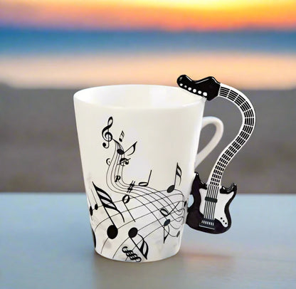 A music themed mug with black guitar handle