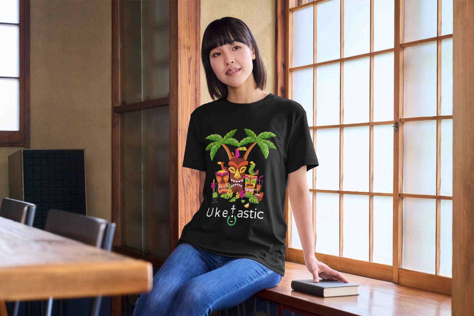 Tiki Black Ukulele T-shirt Front with model 